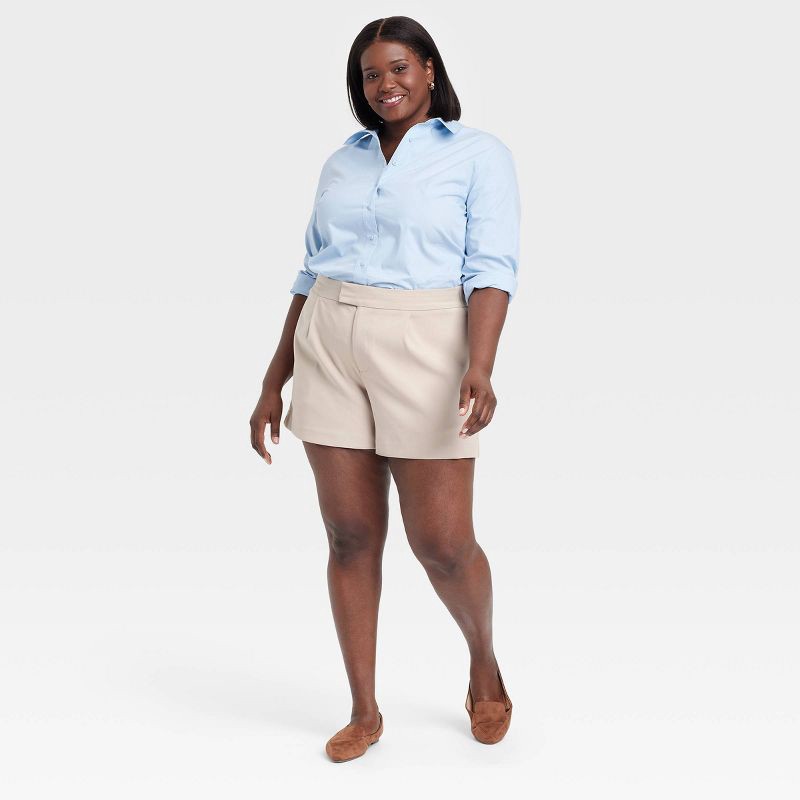 slide 3 of 3, Women's High-Rise Tailored Shorts - A New Day™ Beige 17: Recycled Polyester Blend, Inside Pocket, Machine Washable, 1 ct