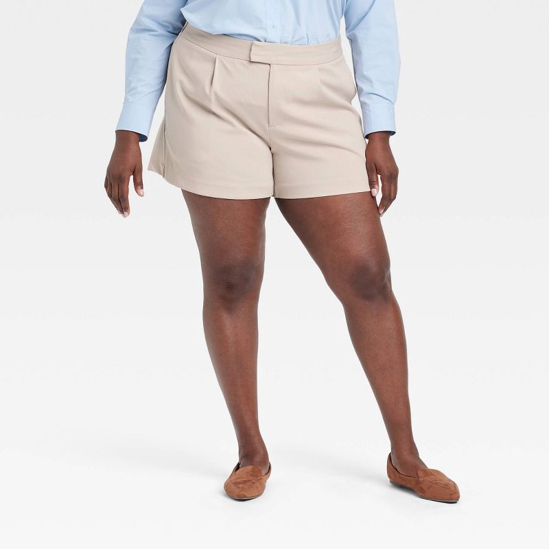 slide 1 of 3, Women's High-Rise Tailored Shorts - A New Day™ Beige 17: Recycled Polyester Blend, Inside Pocket, Machine Washable, 1 ct