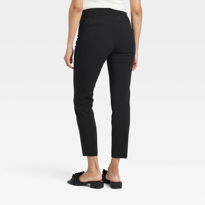 slide 2 of 3, Women's High-Rise Skinny Ankle Pull-On Pants - A New Day™ Black 14: Recycled Polyester, Elastic Waistband, 1 ct