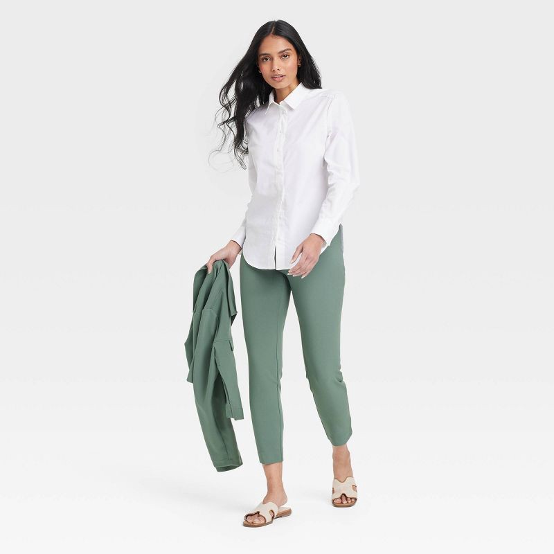 slide 2 of 3, Women's High-Rise Skinny Ankle Pull-On Pants - A New Day™ Olive 8: Recycled Polyester Blend, Slim Straight Fit, Elastic Waistband, 1 ct