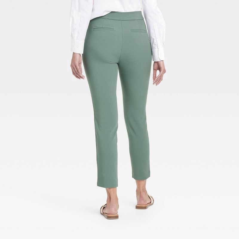 slide 2 of 3, Women's High-Rise Skinny Ankle Pull-On Pants - A New Day™ Olive 12: Recycled Polyester Blend, Slim Straight Fit, Elastic Waistband, 1 ct