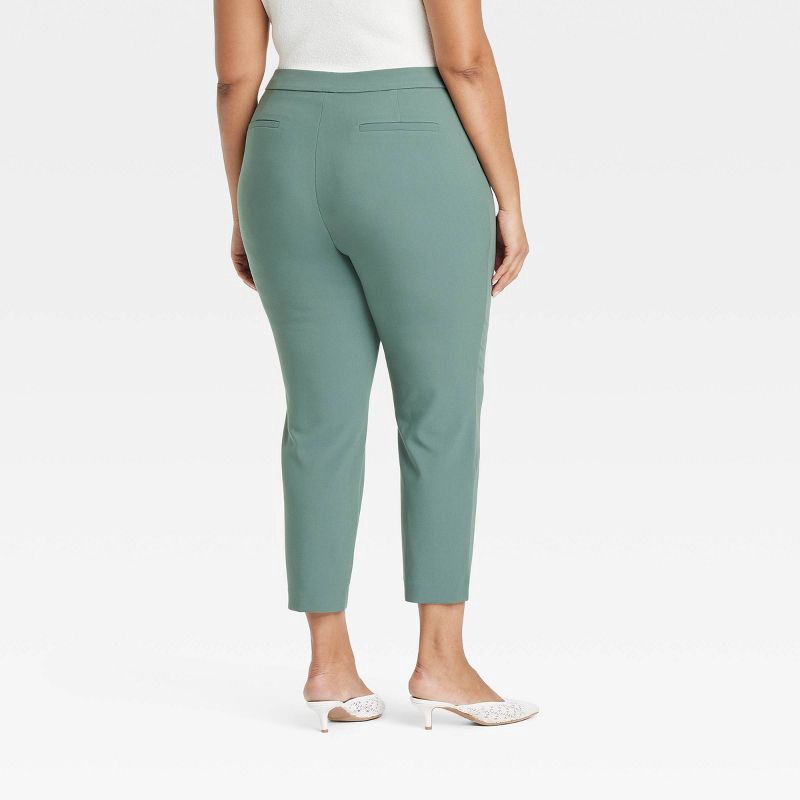slide 2 of 3, Women's High-Rise Skinny Ankle Pull-On Pants - A New Day™ Olive 17: Recycled Polyester Blend, Elastic Waistband, Machine Washable, 1 ct