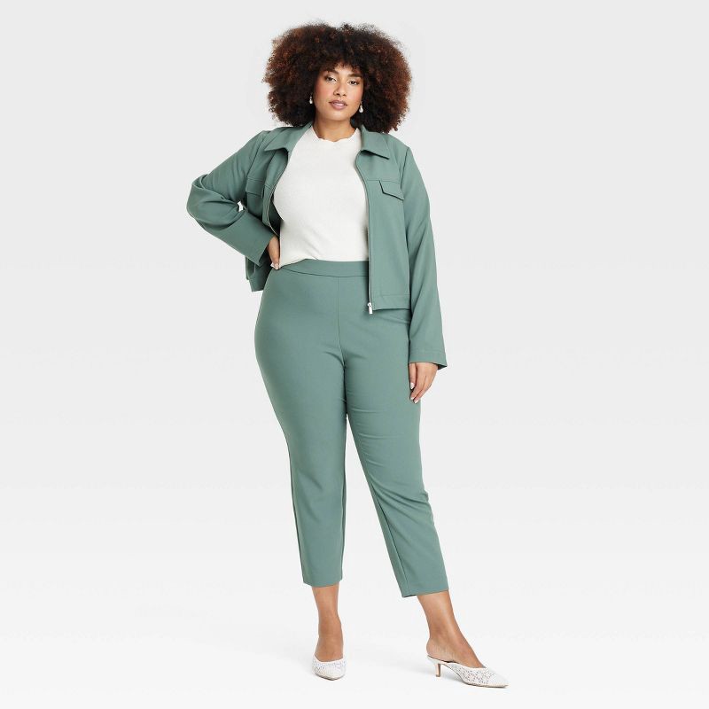 slide 3 of 3, Women's High-Rise Skinny Ankle Pull-On Pants - A New Day™ Olive 17: Recycled Polyester Blend, Elastic Waistband, Machine Washable, 1 ct