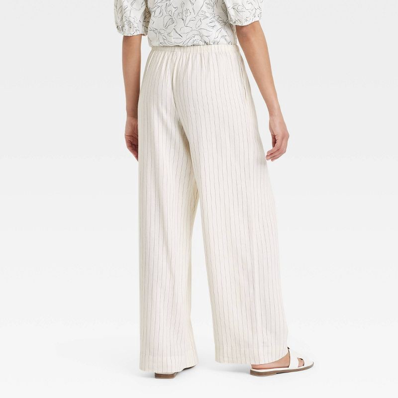 slide 2 of 3, Women's Mid-Rise Wide Leg Linen Pull-On Pants - A New Day™ White Striped L: Seam Pocket, Adjustable Waistband, 1 ct