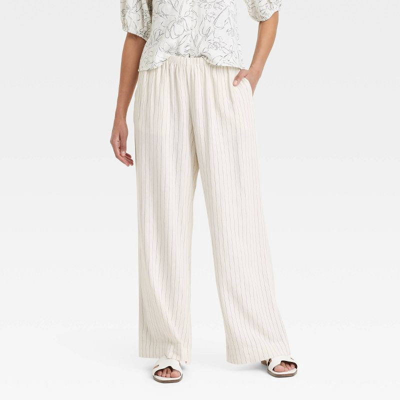slide 1 of 3, Women's Mid-Rise Wide Leg Linen Pull-On Pants - A New Day™ White Striped L: Seam Pocket, Adjustable Waistband, 1 ct