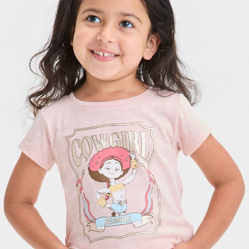slide 2 of 4, Disney Toddler Girls' Jessie Short Sleeve Graphic T-Shirt - Rose Pink 3T, 1 ct
