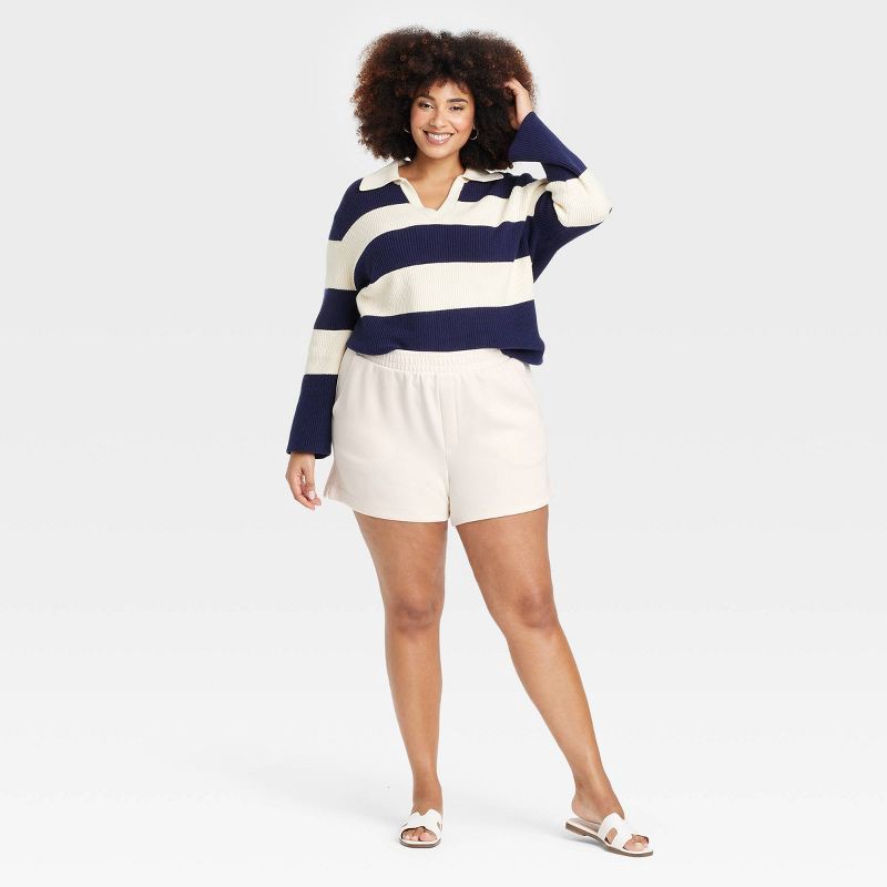 slide 3 of 3, Women's High-Rise Sandwash Pull-On Shorts - A New Day™ Off-White XXL: Recycled Polyester, Rayon, Spandex, Heavyweight Fabric, Slash Pocket, 1 ct