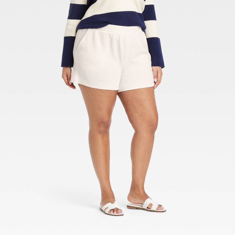 slide 1 of 3, Women's High-Rise Sandwash Pull-On Shorts - A New Day™ Off-White XXL: Recycled Polyester, Rayon, Spandex, Heavyweight Fabric, Slash Pocket, 1 ct