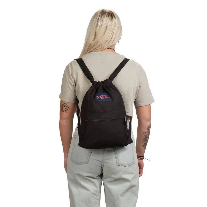 slide 3 of 4, JanSport Drawstring Bag - Black: Lightweight Dobby Shell, Front Zip Pocket, 1 ct