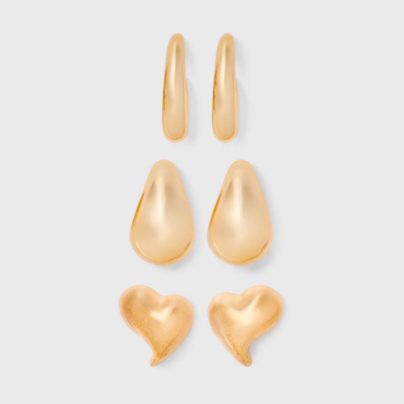slide 1 of 3, Wavy Heart Stud and Hoop Earring Set 3pc - Universal Thread™ Gold: Recycled Zinc, Post Closure, 3 ct
