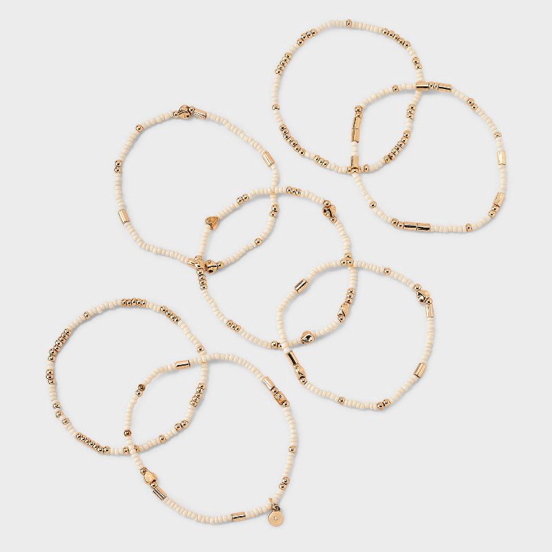 slide 3 of 4, Heart Beaded Bracelet Set 7pc - Universal Thread™ Ivory: Pull-On Stretch Bracelets, Glass & Acrylic, Heart Shape, 2.2" Length, 7 ct