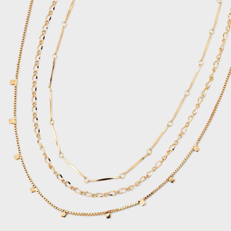 slide 1 of 3, Mixed Chain and Delicate Charm Multi-Strand Necklace - Universal Thread™ Gold: Lobster Claw Clasp, 16" Length, 1 ct