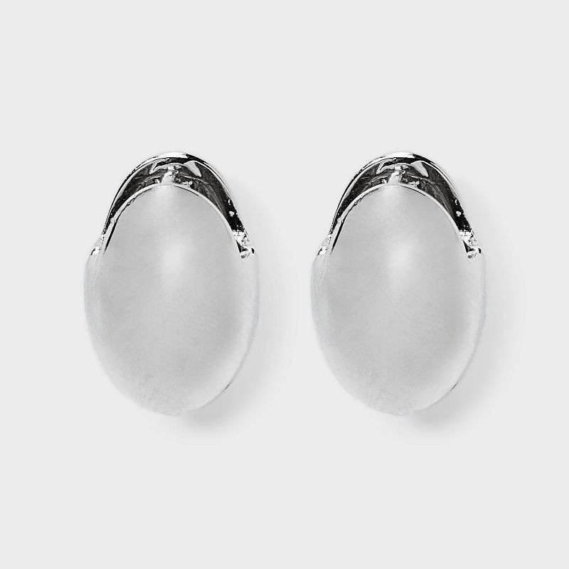 slide 1 of 3, Oval Huggie Earrings - Universal Thread™ Silver: Steel & Nickel-Free Metal, 0.74" Length, 3.7g Weight, 3.7 gram