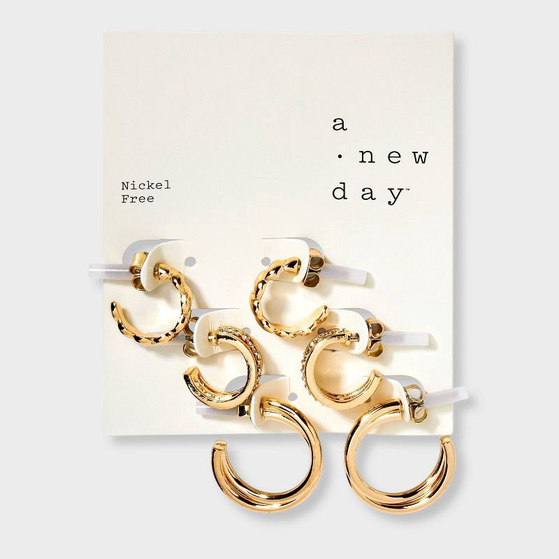 slide 2 of 3, Twisted Hoop Earring Set 3pc - A New Day™ Clear/Gold: Nickel-Free Metal, Post Closure, 3 ct