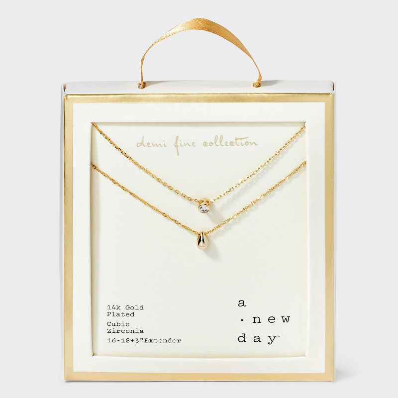 slide 1 of 4, 14K Gold Plated Bezeled Cubic Zirconia Teardrop Multi-Strand Necklace - A New Day™: Polished Brass, Gift Box Included, 1 ct