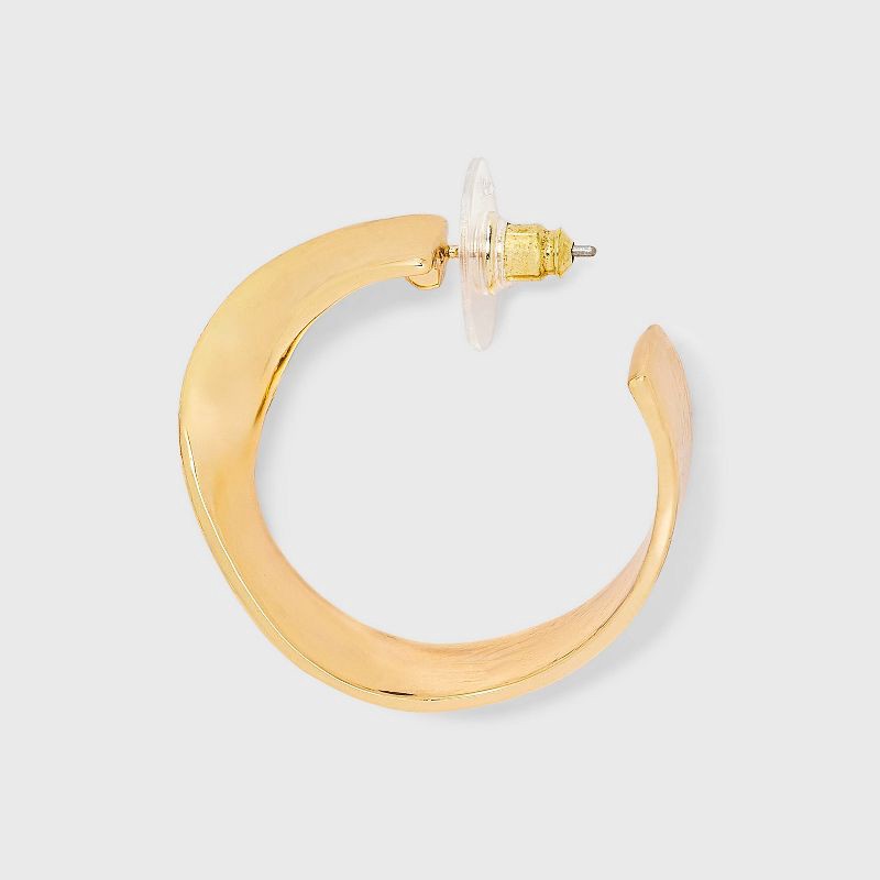 slide 3 of 3, Wavy Open Hoop Earrings - A New Day™ Gold: Nickel-Free Metal, Post Closure, 1.21" Length, 0.66 oz Weight, 0.66 oz