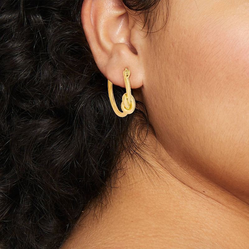 slide 2 of 3, 14K Gold Plated Knotted Smooth Hoop Earrings - A New Day™ Gold: Brass, Nickel-Free, Clip-In Clasp, 1 ct