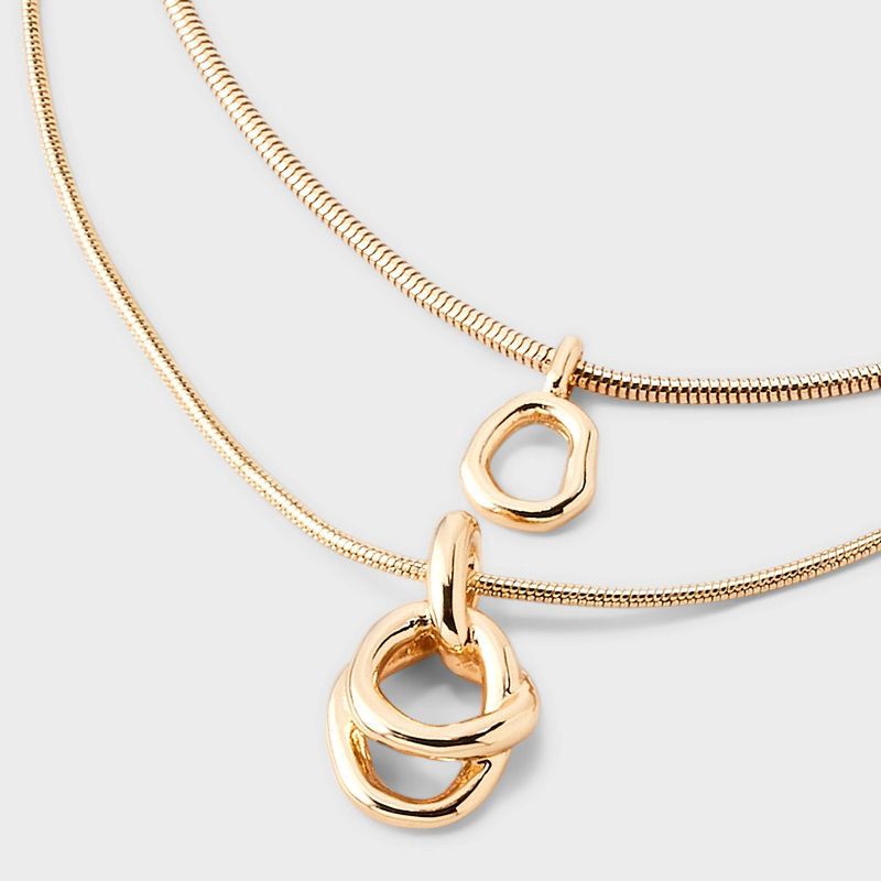 slide 4 of 4, Interlock Circle Pendant Multi-Strand Necklace - A New Day™ Gold: Nickel-Free Metal, Lobster Claw Clasp, 1 ct
