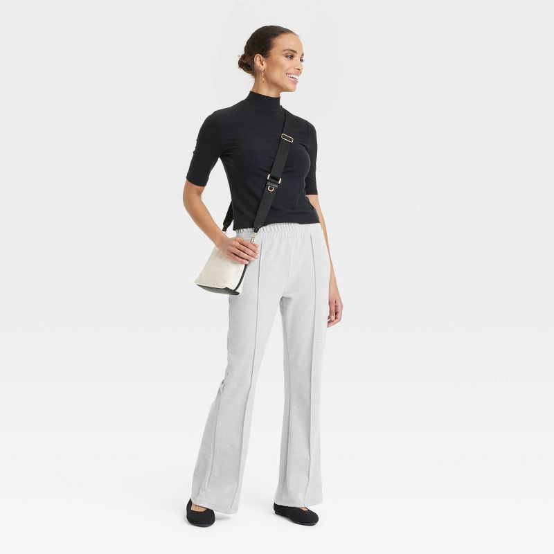 slide 3 of 3, Women's Cozy Wide Leg Flare Pants with Front Seam and Smocked Waistband - A New Day™ Heather White L: High Rise, Relaxed Fit, Power Stretch, 1 ct