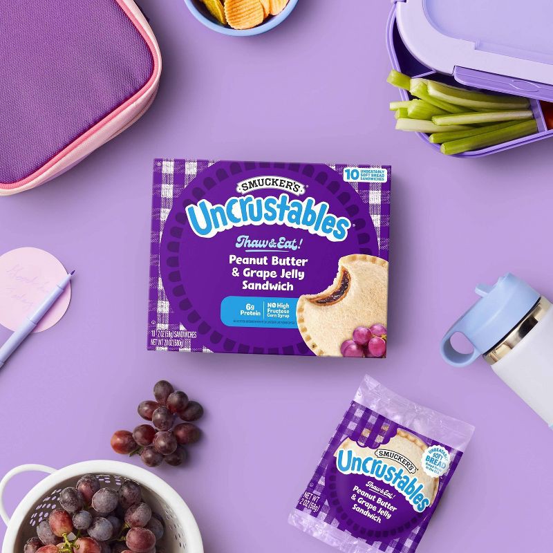 slide 3 of 10, Smucker's Uncrustables Frozen Peanut Butter & Grape Jelly Sandwich - 20oz/10ct, 10 ct; 20 oz