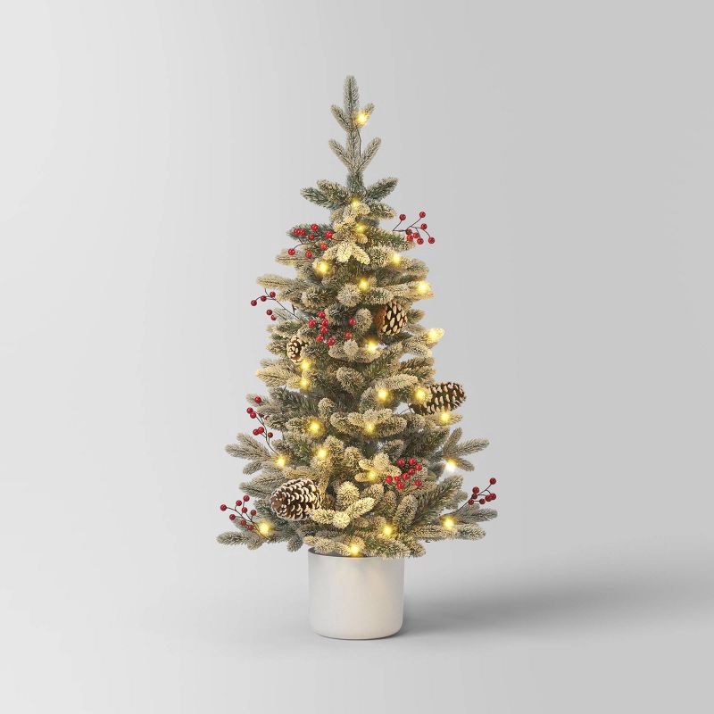 slide 1 of 5, 3.5' Pre-Lit Potted Flocked Balsam Artificial Christmas Tree with Berries and Pine Cones - Wondershop™, 1 ct