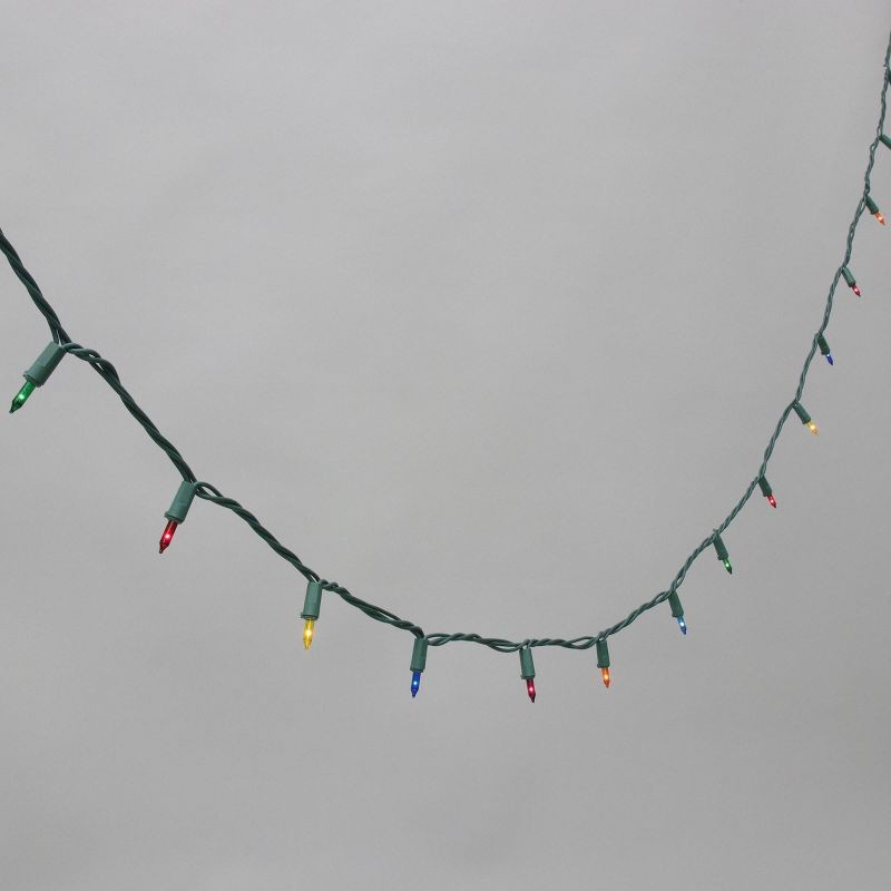 slide 1 of 5, Philips 100ct Heavy Duty Incandescent Smooth Mini String Lights with Green Wire and Remains Lit Technology, 100 ct