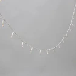 Philips 100ct Heavy Duty Incandescent Smooth Mini String Lights with Green Wire and Remains Lit Technology