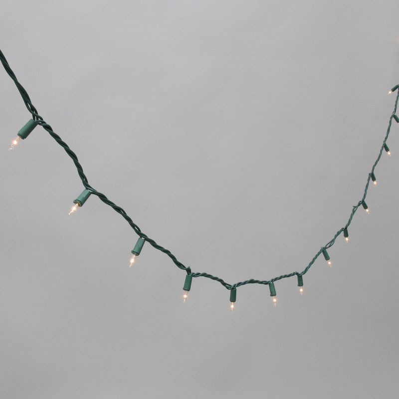 slide 1 of 5, Philips 100ct Heavy Duty Incandescent Smooth Mini String Lights with Green Wire and Remains Lit Technology, 100 ct