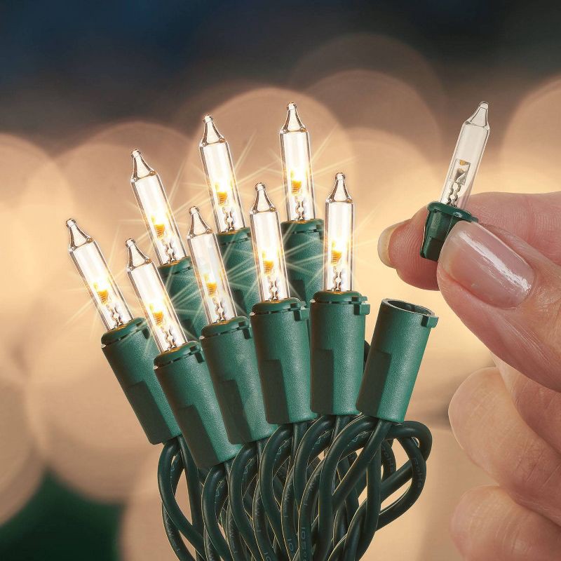 slide 2 of 3, 300ct LED Sylvania Stay-lit Incandescent Look Indoor Outdoor Miniature String Light Warm White with Green Wire, 300 ct