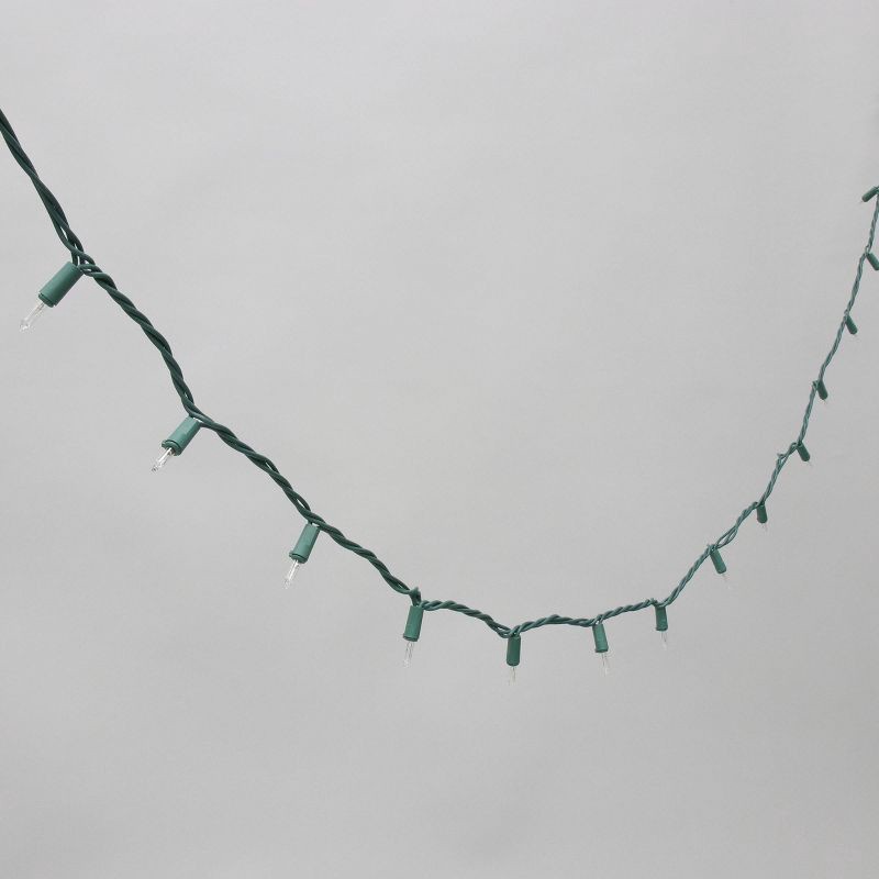 slide 3 of 5, Philips 200ct Heavy Duty Incandescent Indoor/Outdoor Miniature String Lights Clear with Green Wire and Remains Lit Technology, 200 ct