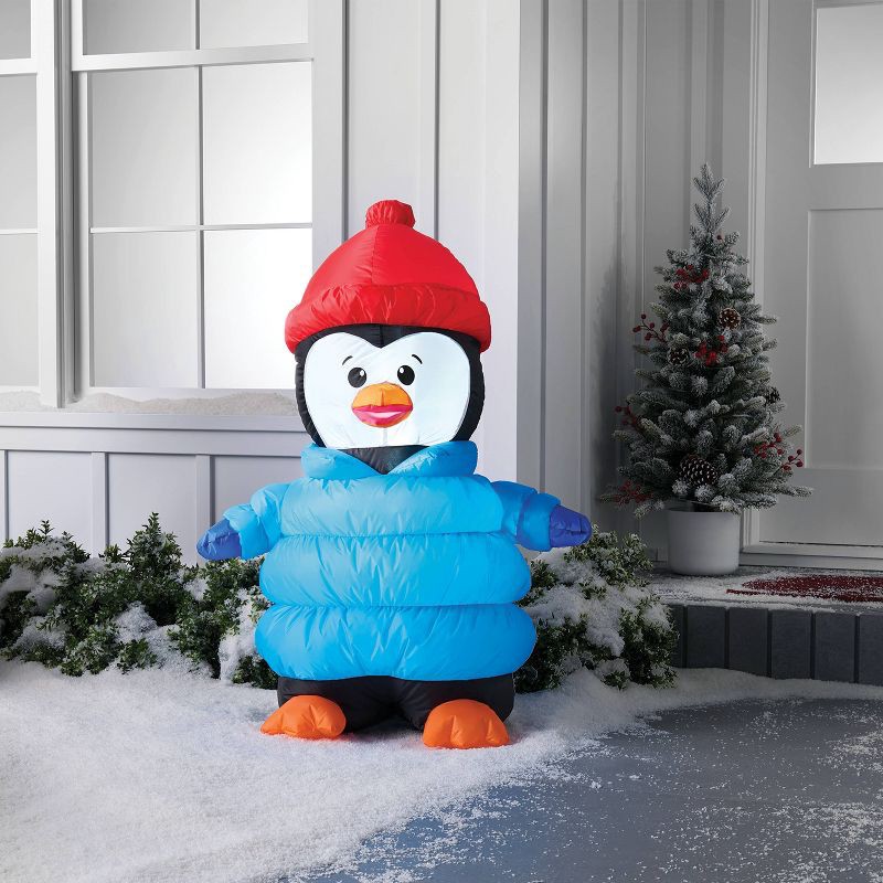 slide 2 of 3, 3'x4' Christmas Indoor/Outdoor Lighted Inflatable Penguin in Puffer Jacket - Wondershop™, 1 ct