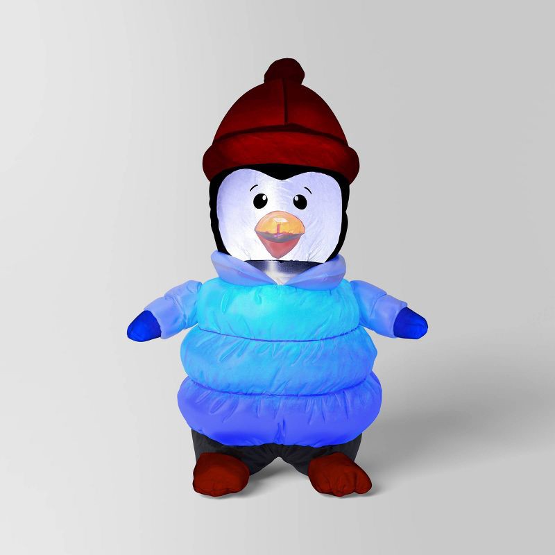 slide 1 of 3, 3'x4' Christmas Indoor/Outdoor Lighted Inflatable Penguin in Puffer Jacket - Wondershop™, 1 ct