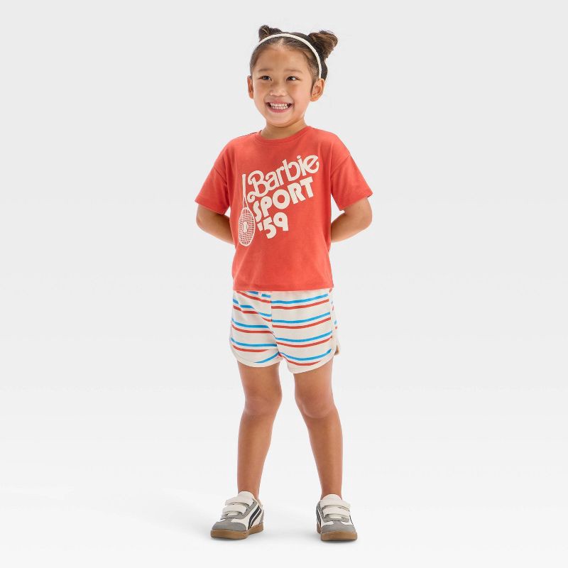 slide 1 of 4, Toddler Girls' 2pc Mattel Barbie Sporty Retro T-Shirt & Striped Shorts Set - Red 5T, 2 ct