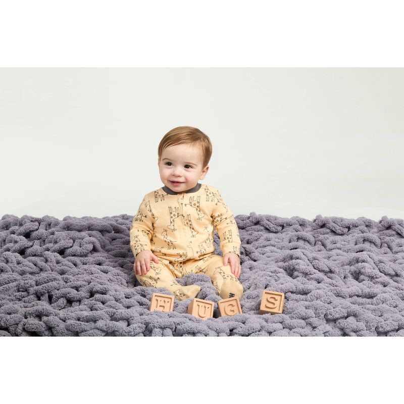 slide 4 of 7, Huggies Baby Giraffes Sleep N' Play - Cream 9M: Organic Cotton Pajama Romper, Lightweight Knit Fabric, 1 ct