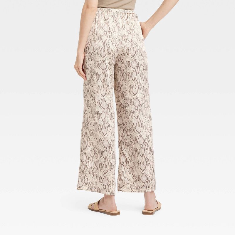 slide 2 of 3, Women's Mid-Rise Pull-On Satin Pants - A New Day™ Cream L: Snakeskin Pattern, Wide Leg, Lightweight Polyester, 30.5" Inseam, 1 ct