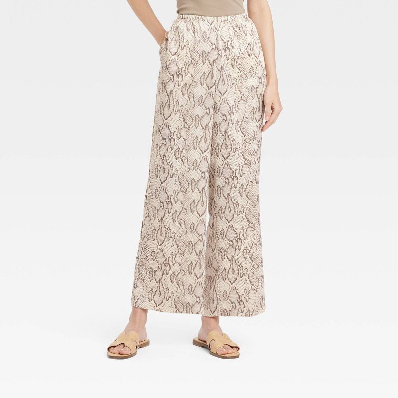 slide 1 of 3, Women's Mid-Rise Pull-On Satin Pants - A New Day™ Cream L: Snakeskin Pattern, Wide Leg, Lightweight Polyester, 30.5" Inseam, 1 ct