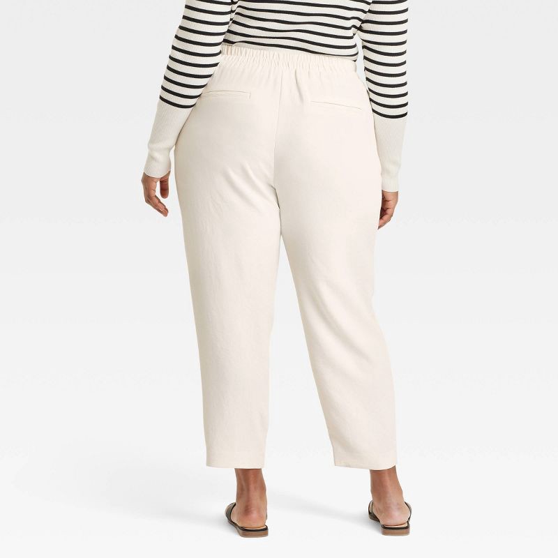 slide 2 of 3, Women's Signature Crepe Tapered Ankle Pull-On Pants - A New Day™ Off-White XXL: High Rise, Back Elastic, 27" Inseam, 1 ct