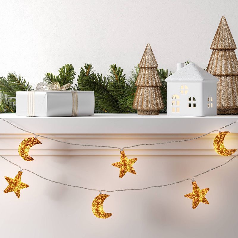 slide 2 of 4, 10ct LED Battery Operated Faux Mercury Star and Moon Christmas Indoor/Outdoor Novelty String Lights Warm White with Clear Wire - Wondershop™, 10 ct