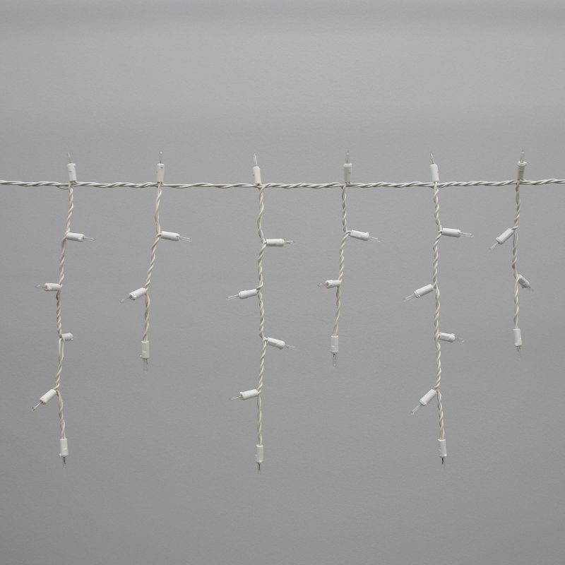 slide 3 of 6, 200ct Philips Heavy Duty Indandescent Smooth Mini Icicle Lights with White Wire and Remains Lit Technology, 200 ct