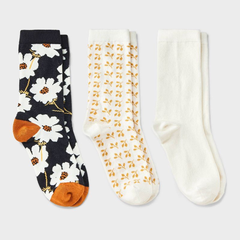 slide 1 of 3, Women's Floral 3pk Crew Socks - A New Day™ Black/Ivory/Gold 4-10: Tagless, Smooth Toe Seams, 3 ct