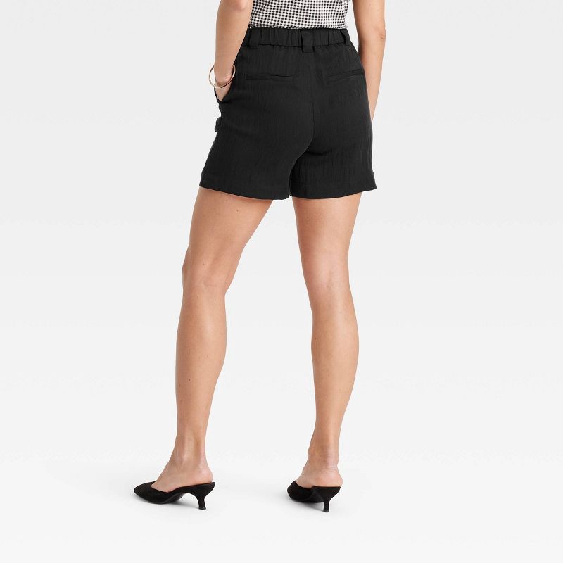 slide 2 of 3, Women's High-Rise Flat-Front Chino Shorts - A New Day™ Black 12: Lightweight Twill, Back Elastic, 5" Inseam, 1 ct
