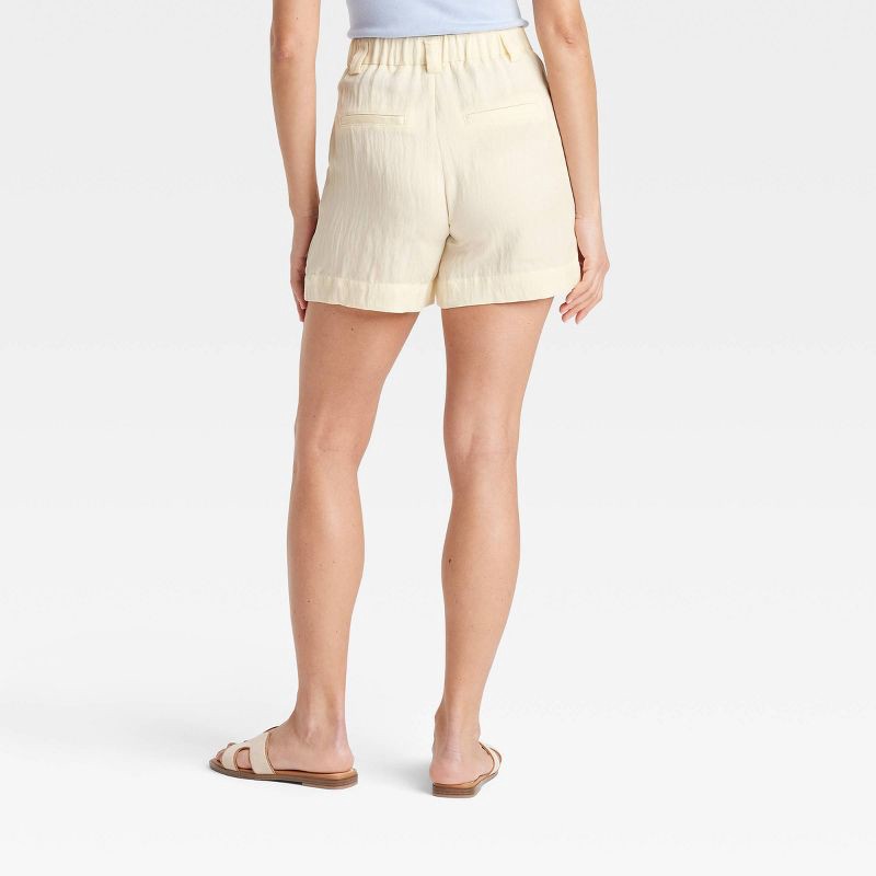slide 2 of 3, Women's High-Rise Flat-Front Chino Shorts - A New Day™ White 14: Lightweight Twill, Regular Fit, 5" Inseam, Fly Button Closure, 1 ct