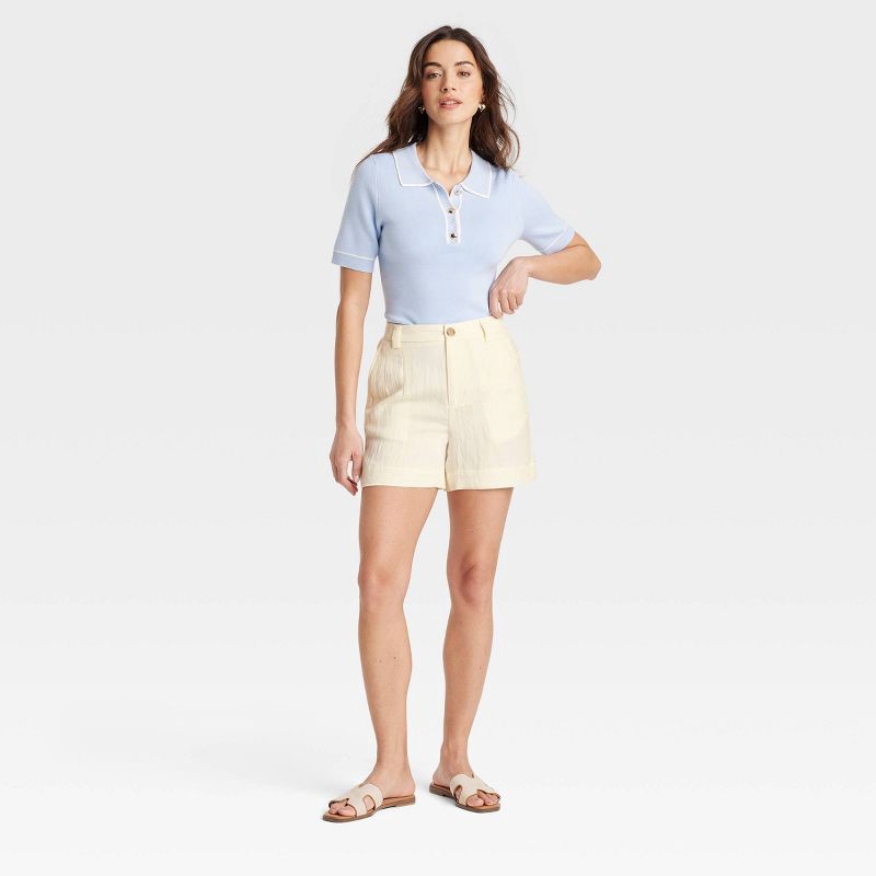 slide 3 of 3, Women's High-Rise Flat-Front Chino Shorts - A New Day™ White 14: Lightweight Twill, Regular Fit, 5" Inseam, Fly Button Closure, 1 ct