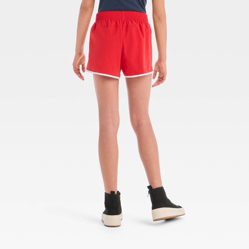 slide 2 of 3, Girls' Woven Piped Shorts - All In Motion™ Red XL, 1 ct