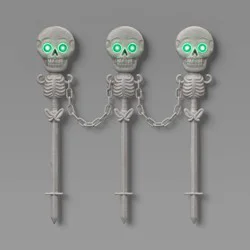 49" Skeletons Fence Stakes Halloween Decorative Prop Off-White - Hyde and EEK! Boutique™