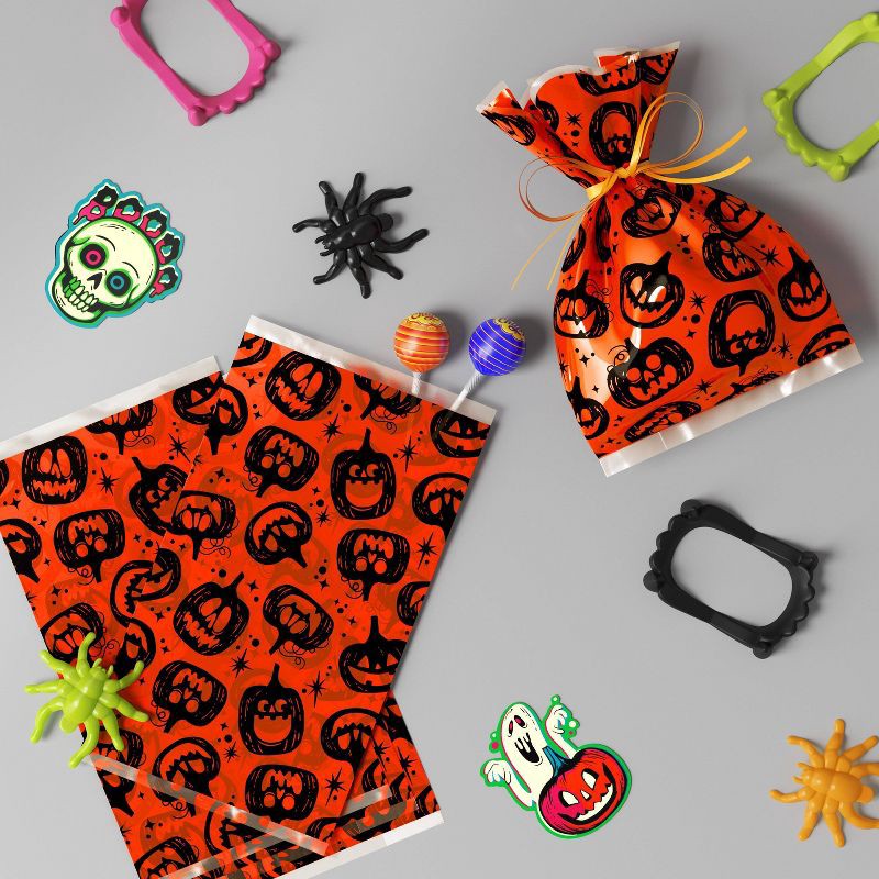 slide 2 of 3, 12ct Pumpkin Cello Bag Party Favors - Hyde and EEK! Boutique™, 12 ct
