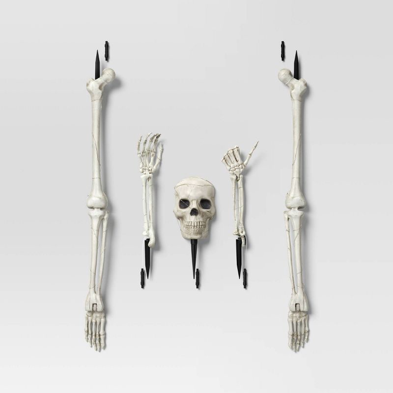 slide 1 of 3, 5pc Skeleton Parts Stake Lights with Remote Halloween Decorative Prop Off White - Hyde and EEK! Boutique™, 5 ct