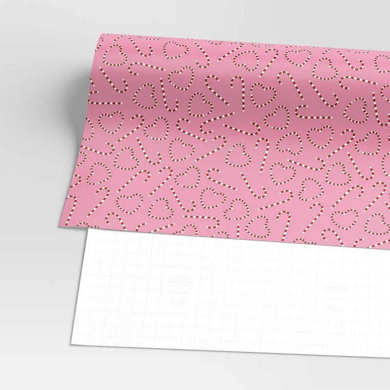 slide 3 of 3, 30" 55 sq ft Christmas Roll Wrap Red/White Heart/Candy Canes on Pink - Wondershop™, 55 sq ft