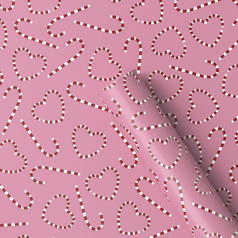 slide 1 of 3, 30" 55 sq ft Christmas Roll Wrap Red/White Heart/Candy Canes on Pink - Wondershop™, 55 sq ft