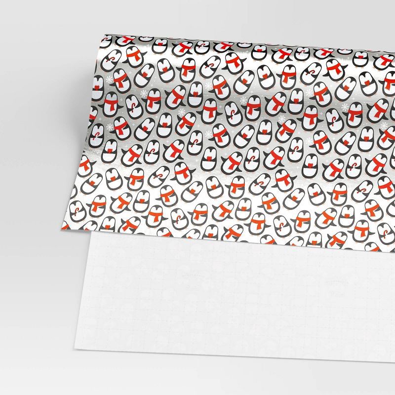 slide 3 of 3, 30" 25 sq ft Christmas Roll Wrap Penguins on Silver - Wondershop™, 25 sq ft